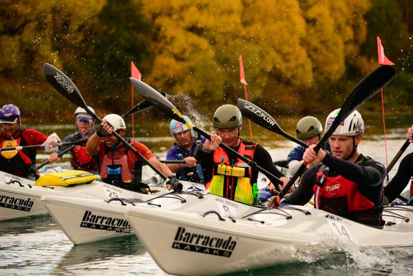 Competitors battle on the Clutha River